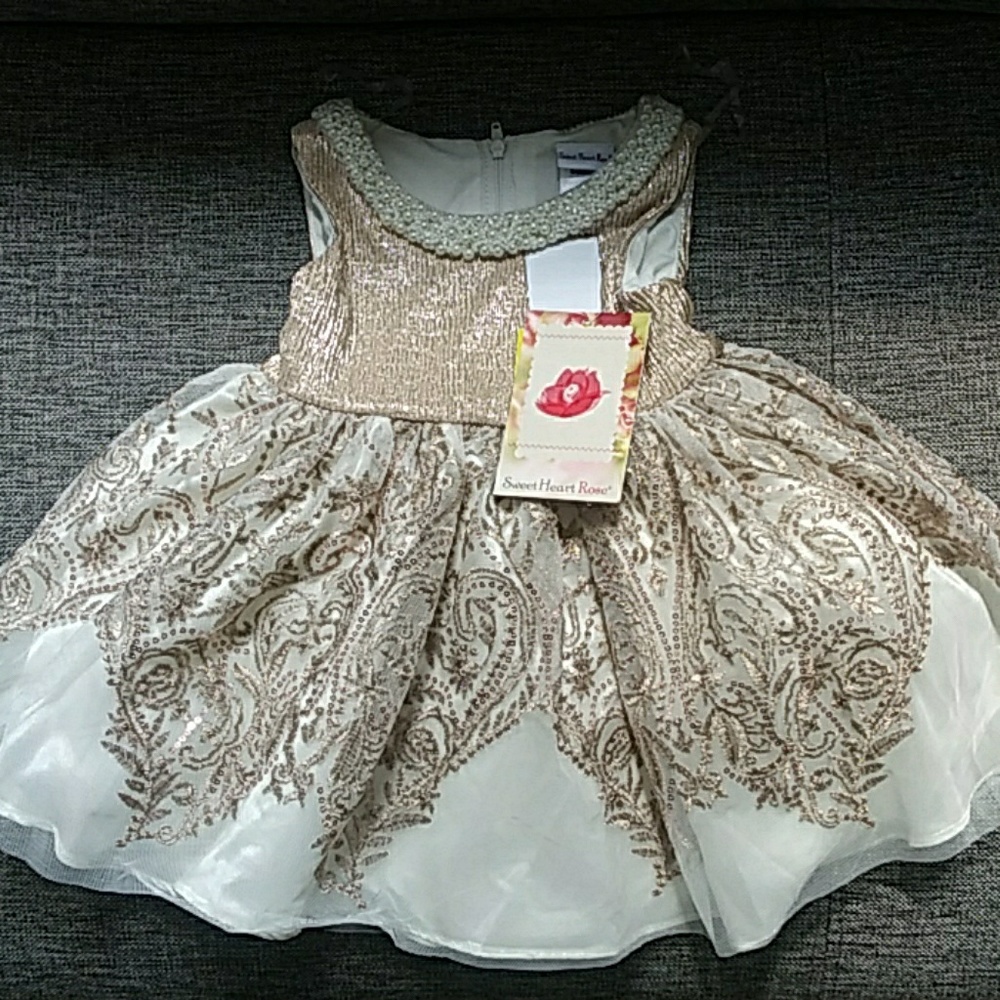 Beautiful sequined dress with beaded detail.